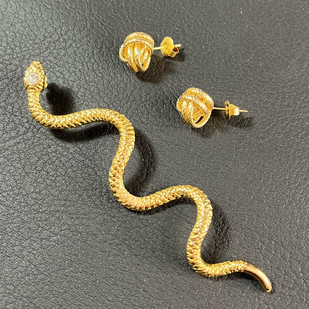 Gold Tone Snake Earring Paired with a Set of Twisted Love Knot Studs